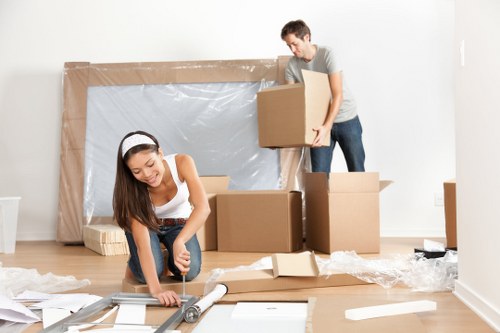 Movers loading boxes for same day removals in Whitecity