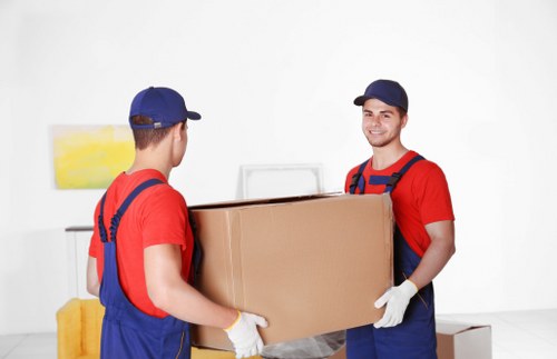 Professional flat removals in Whitecity with careful packing and loading