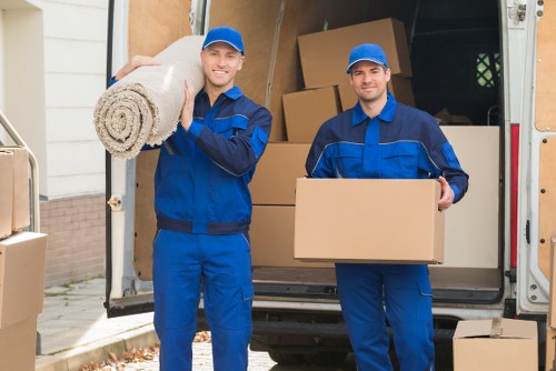 Unpacking and organising belongings in a White City property