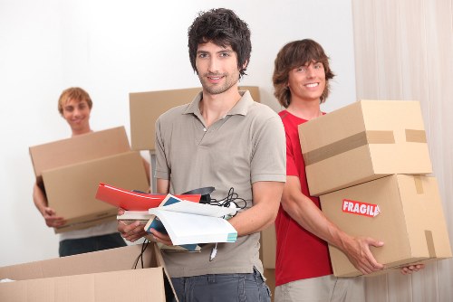 Professional removal team managing a house move in Whitecity