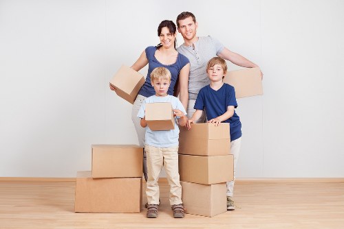 Office move team handling desks and equipment in a local business relocation