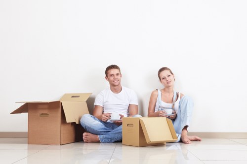 Trained movers handling furniture with care