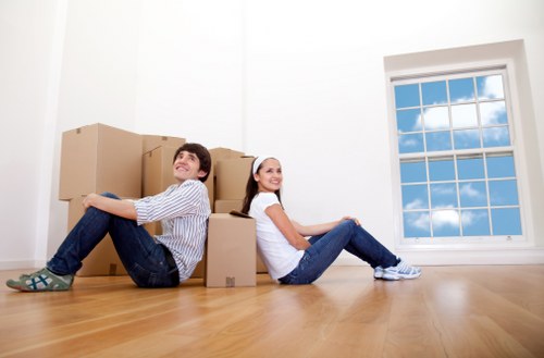 Trained staff handling furniture carefully during a move