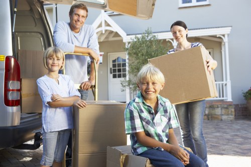 Whitecity furniture removal team collecting sofas and chairs