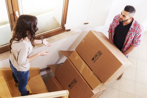 Packed moving boxes ready for removals in Whitecity