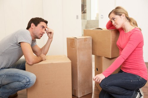 Unpacking and arranging household items in a new Whitecity home