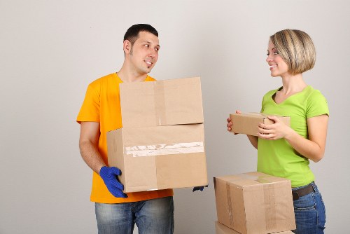 Preparation checklist and organised cartons for a move in White City